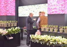 Josef Heuger of Heuger talking with visitors.